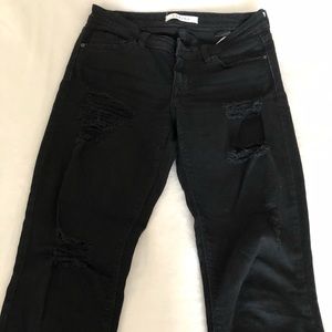 Black ripped jeans size 7